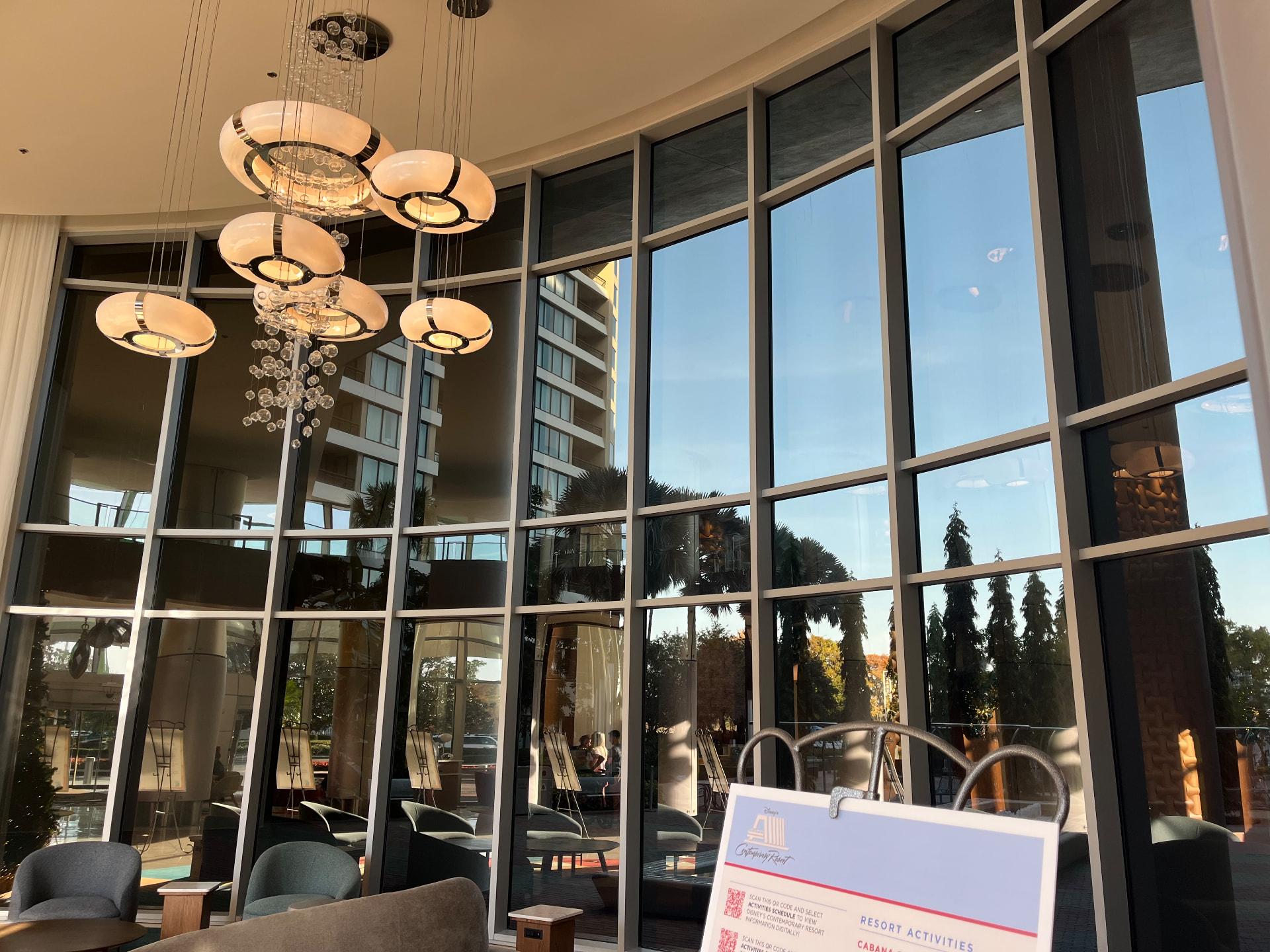 Resort lobby with large tinted windows and Florida views